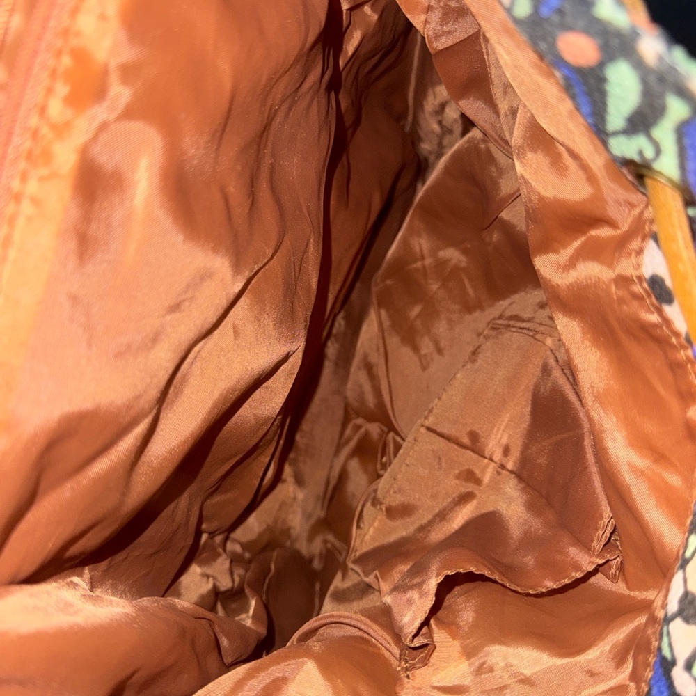 Patterned Backpack With Brown Accents - image 3